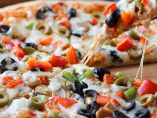 Disfruta del Día de la Pizza con Promociones Irresistibles desde $1